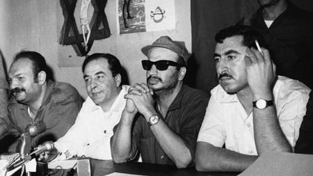 1970 - Arafat with Democratic Front for the Liberation of Palestine leader, Nayef Hawatmeh and Palestinian writer Kamal Nasser at press conference in Amman. Palestinian groups are now trying to strengthen their existing unity. Photo: Wikimedia commons