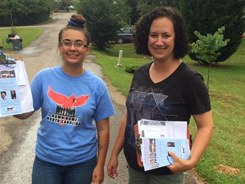 Two canvassers with clipboards