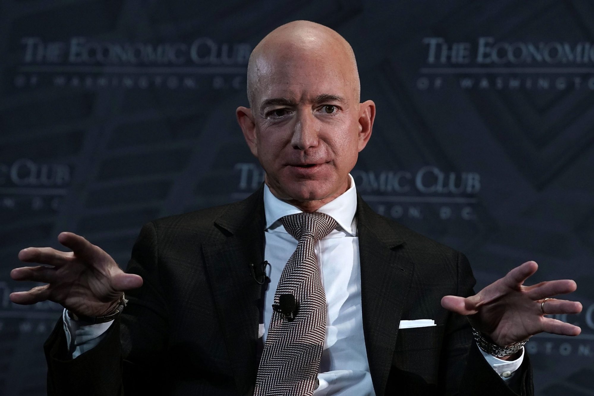 CEO and founder of Amazon Jeff Bezos participates in a discussion during a Milestone Celebration dinner September 13, 2018 in Washington, DC. Economic Club of Washington celebrated its 32nd anniversary at the event. Photo by Alex Wong/Getty Images