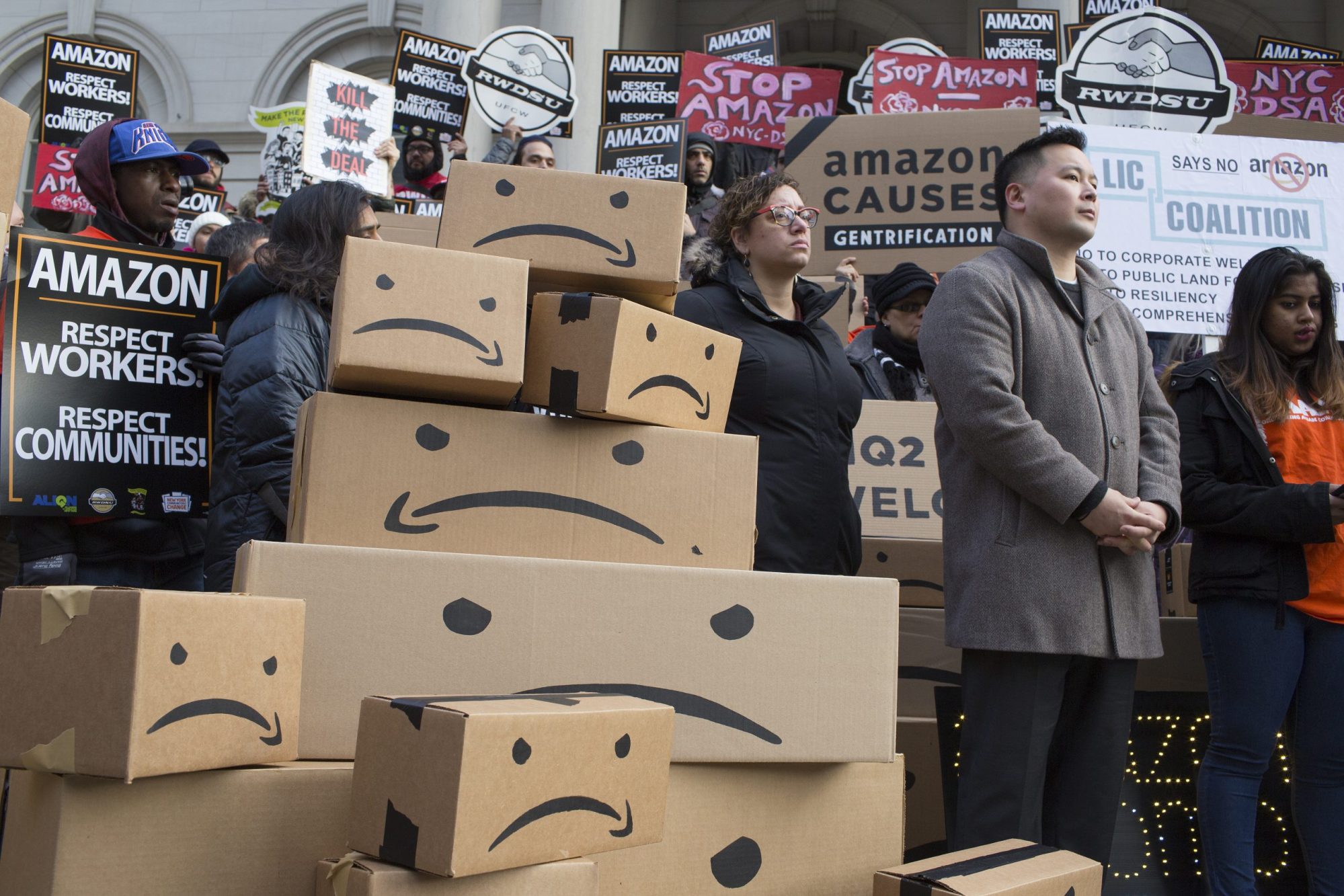 Activists, New York City politicians, and union members hold a press conference on the steps of City Hall to voice their opposition to a tax break deal given to Amazon, on December 12, 2018 in New York City. Photo by Andrew Lichtenstein/Corbis via Getty Images