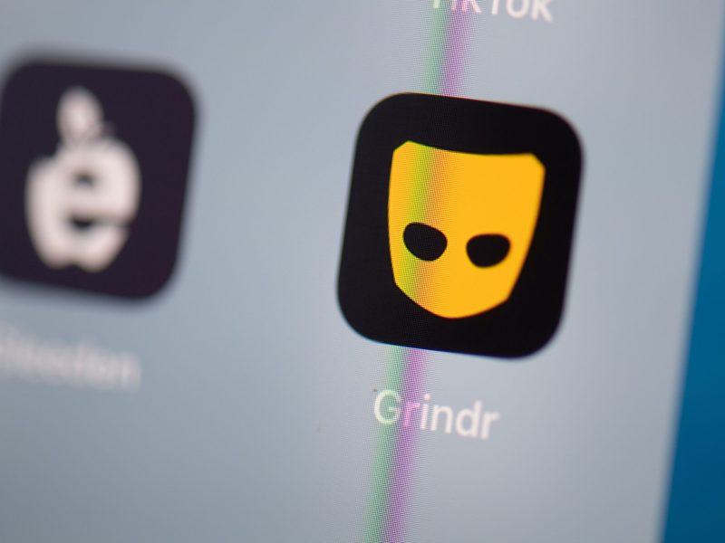 This illustration picture taken on July 24, 2019 in Paris shows the logo of the US social networking application Grindr on the screen of a tablet. Photo by MARTIN BUREAU/AFP via Getty Images