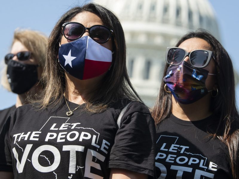 Texas State Representatives Mary Ann Perez, center, District 144, and Christina Morales, right, District 145