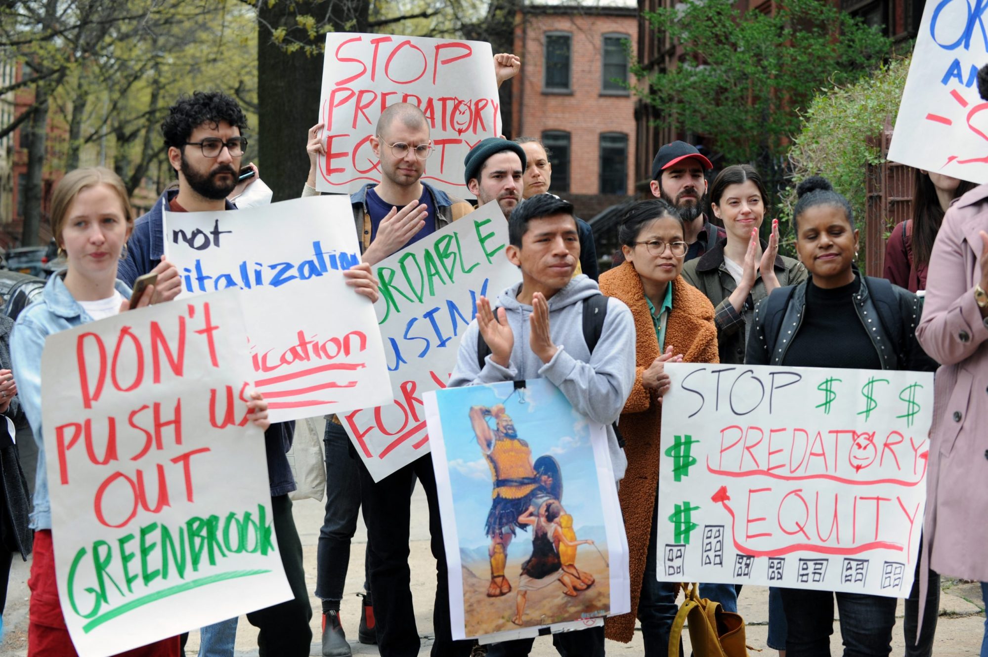 People gather to protest rent increases and aggressive evictions and in support of tenant rights, on April 23, 2022, in the Brooklyn borough of New York City