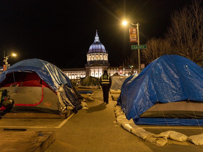 Urban Alchemys Rodney Wrice patrols a homeless tent village a block away from San Francisco's City Hall in the Tenderloin neighborhood of San Francisco on Thursday, Jan. 27, 2022.