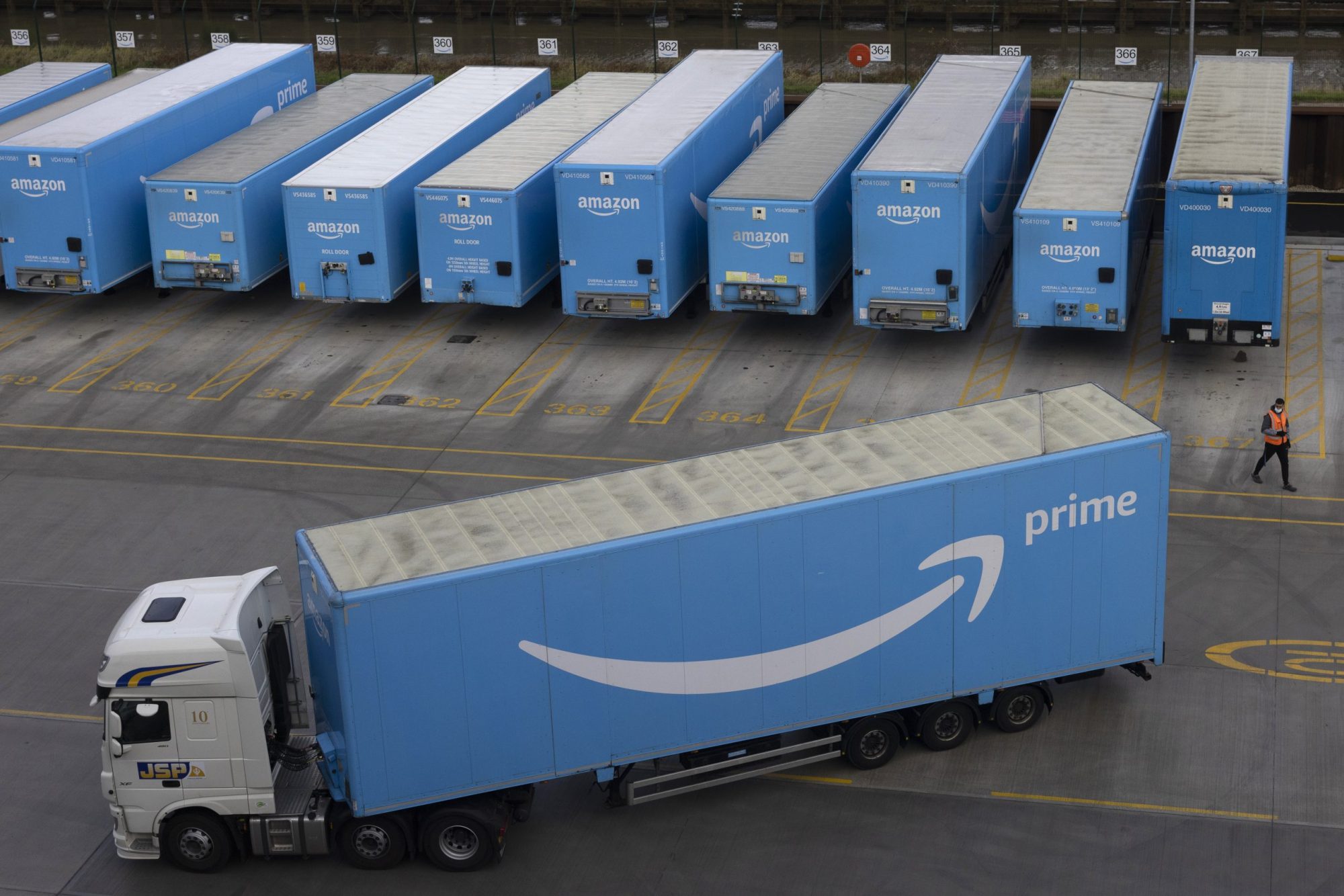 Amazon Prime lorries are seen at the Amazon fulfilment centre on December 13, 2021, in London, England.