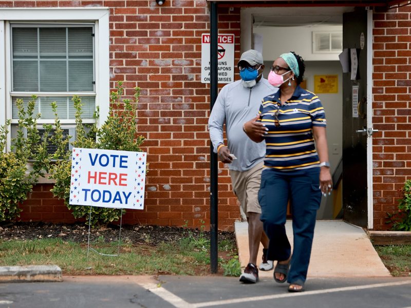 Voters visit a polling station as they cast their ballots at the Israel Missionary Baptist Church on May 24, 2022, in Atlanta, Georgia.
