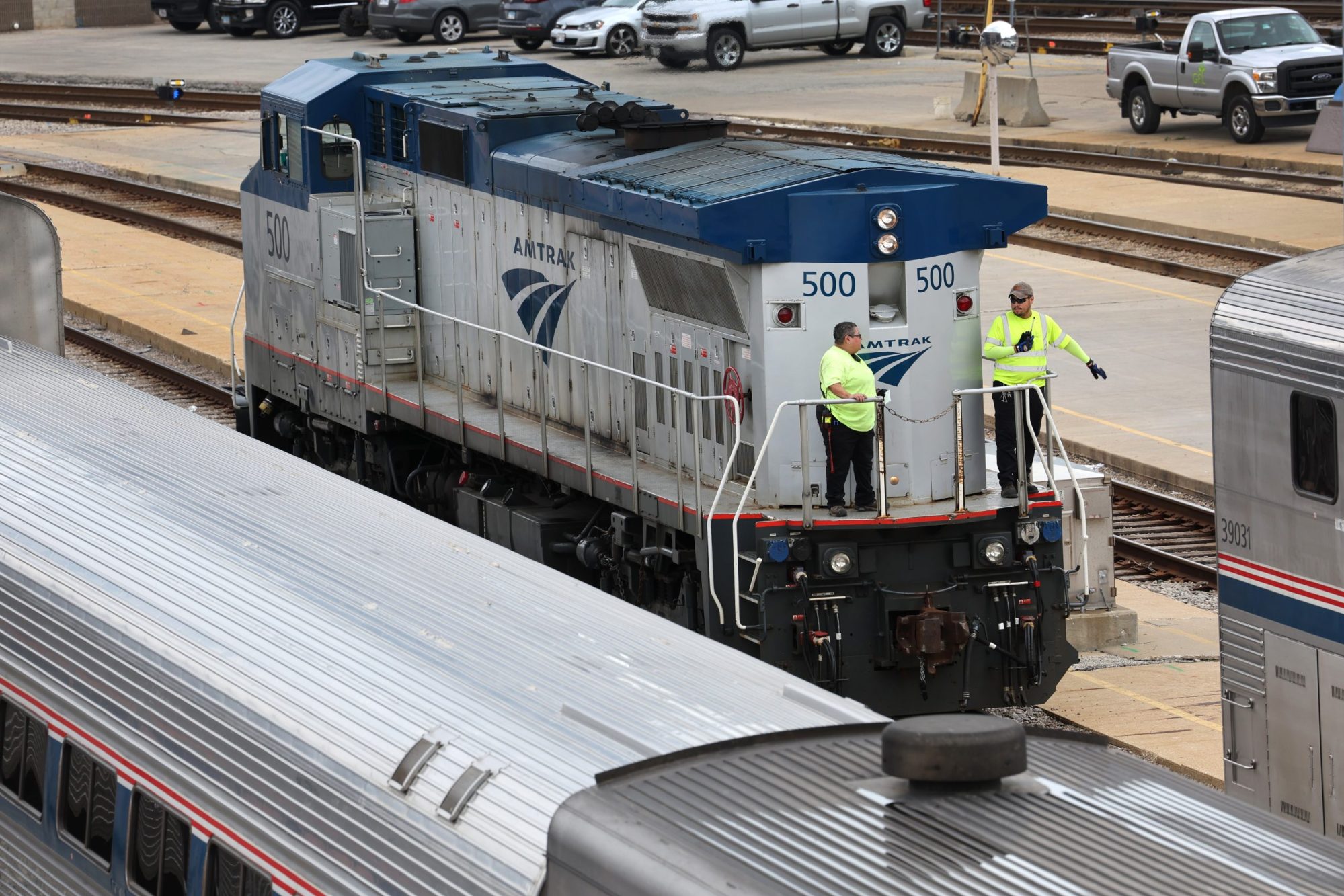 Workers service trains in the Amtrak Car Yard south of the Loop on September 13, 2022 in Chicago, Illinois. Photo by Scott Olson/Getty Images