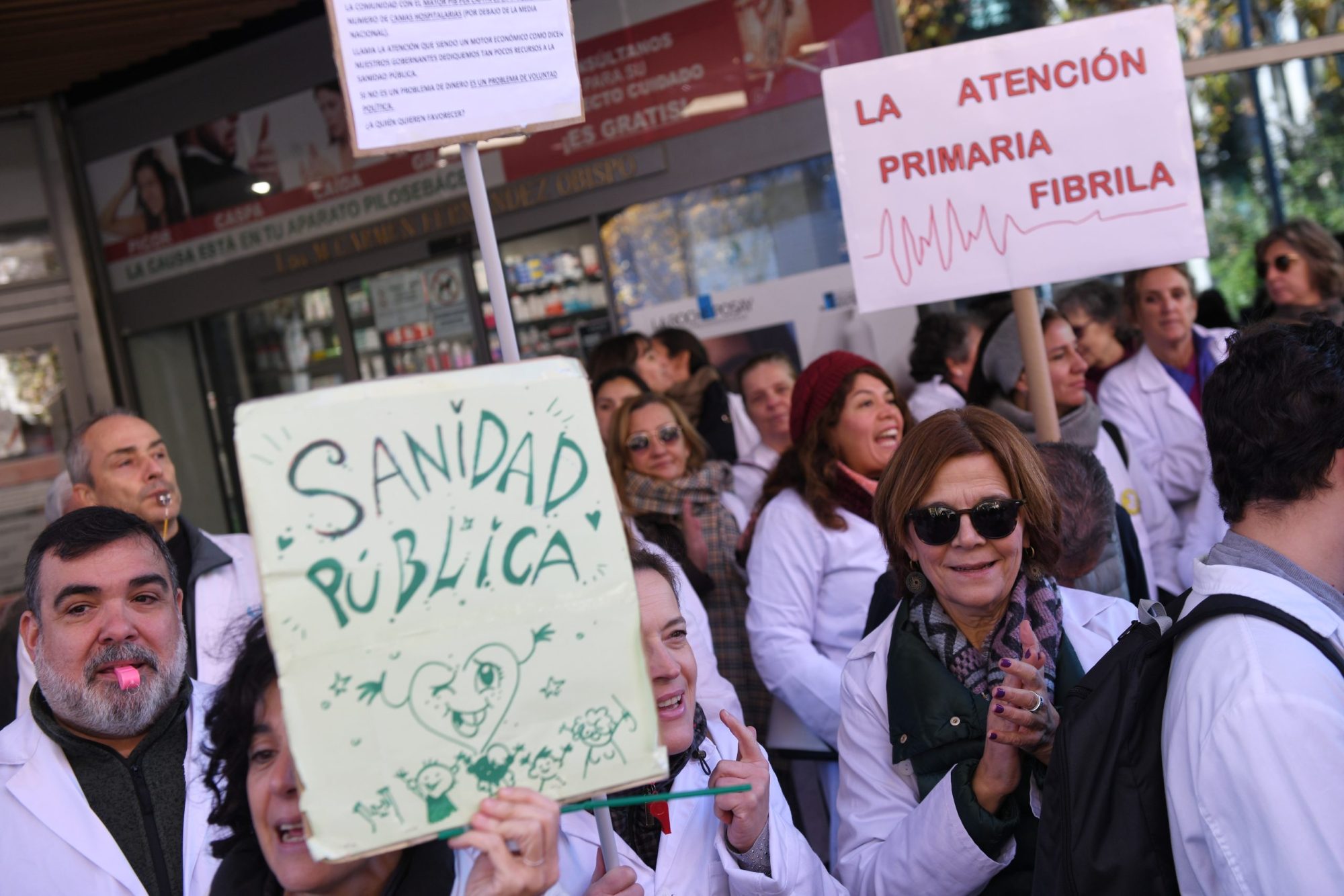 People holding protest signs.