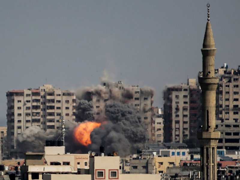An explosion on a residential tower caused by Israeli raids in the northern Gaza Strip on October 12, 2023 in Gaza City, Gaza. Photo by Ahmad Hasaballah/Getty Images