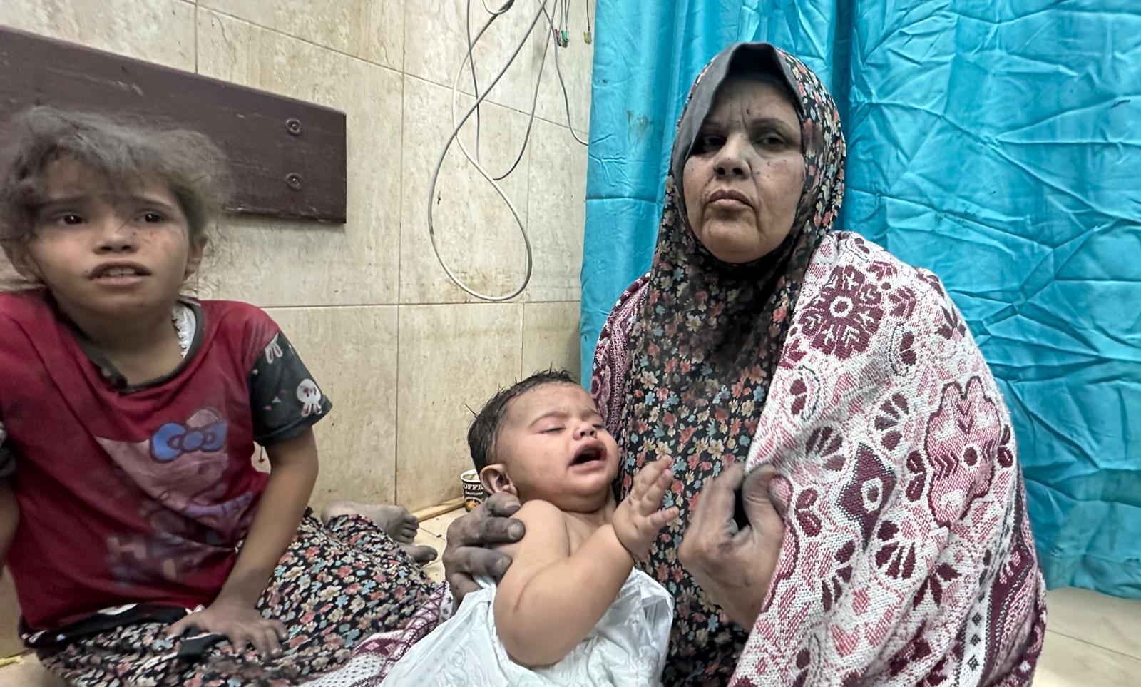 Injured Palestinians, including children, are taken to the Al-Shifa Hospital following the Israeli attacks on the Nasirat Refugee Camp in Gaza City, Gaza on November 3, 2023.
