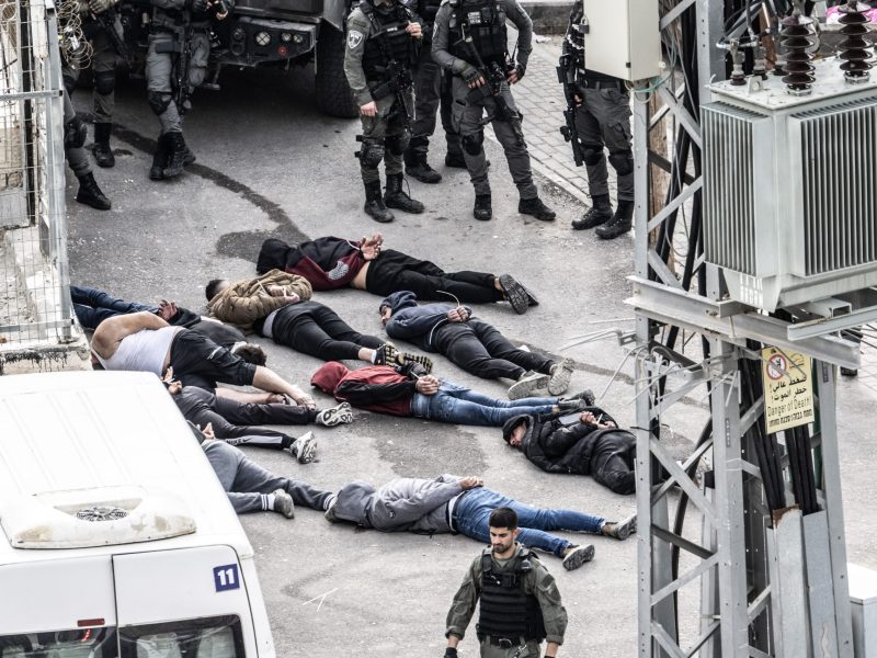 Israeli forces detain Palestinians protesting against the demolition of a building belonging to Palestinians, which they claimed as unlicensed at Jabel Mukaber Neighborhood in East Jerusalem on January 03, 2024. Photo by Mostafa Alkharouf/Anadolu via Getty Images