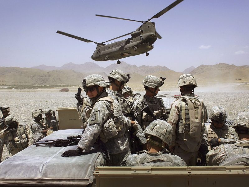 American soldiers from the 10th Mountain Division deploy to fight Taliban fighters as part of Operation Mountain Thrust to a U.S. base near the village of Deh Afghan on June 22, 2006 in the Zabul province of Afghanistan. Photo by John Moore/Getty Images