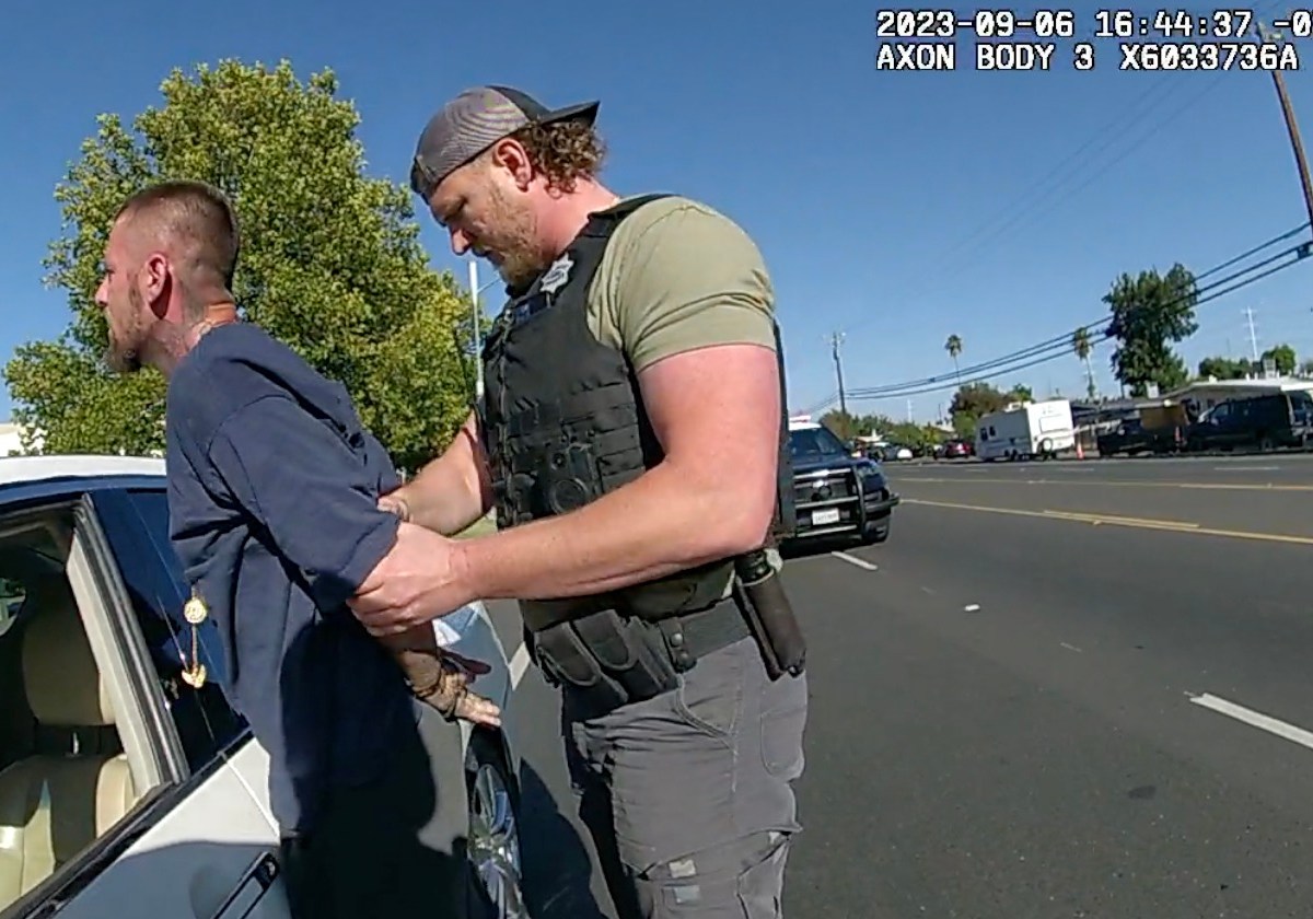 An officer with the Sacramento Sheriff's Office's Gang Suppression Unit arrests Jacob Palkovic after stopping his car at gunpoint. Photos courtesy of Jennifer Kretschman and Sacramento Sheriff's Office body worn camera