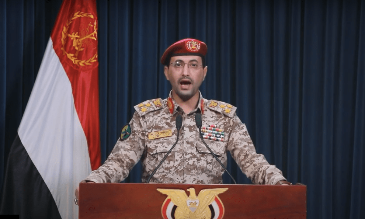 Ansarallah Spokesman Yahya Saree delivers an address reporting on a recent Yemeni military operation in the Red Sea. Screenshot courtesy of Al Masirah TV