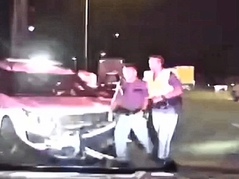 Photo taken from professional truck driver Shawn Foutch cab camera showing the accidental collision with a Washington State patrol officer. Photo Courtesy-Shawn Foutch